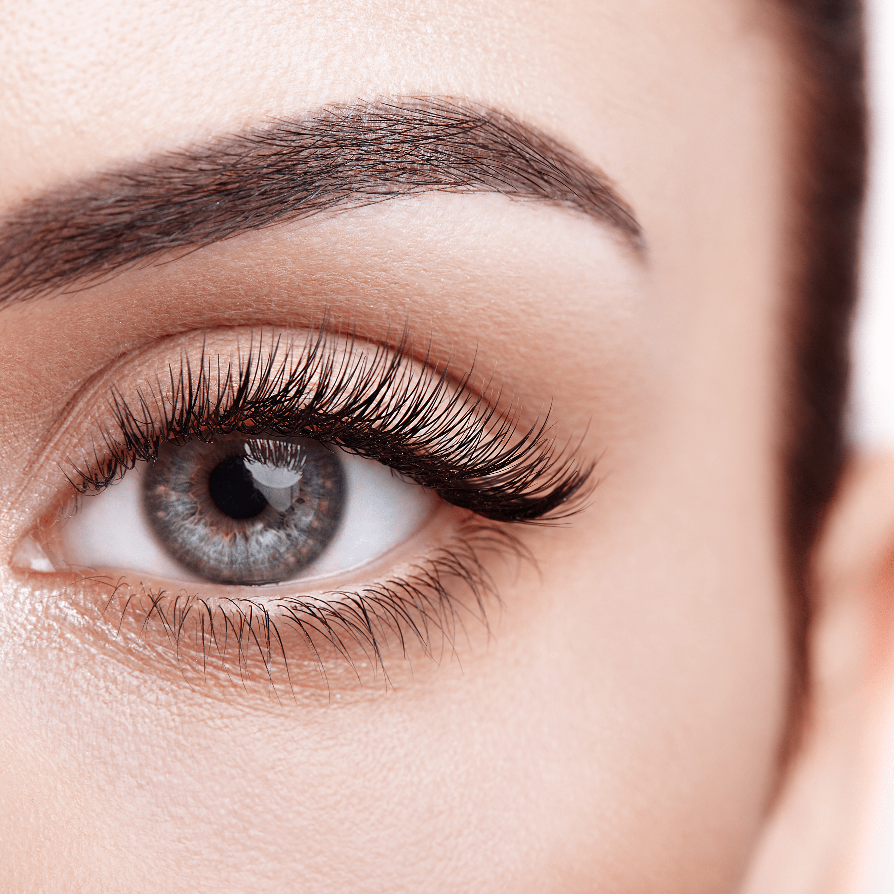 Close-up of eye with perfectly applied half lashes for a natural lift.