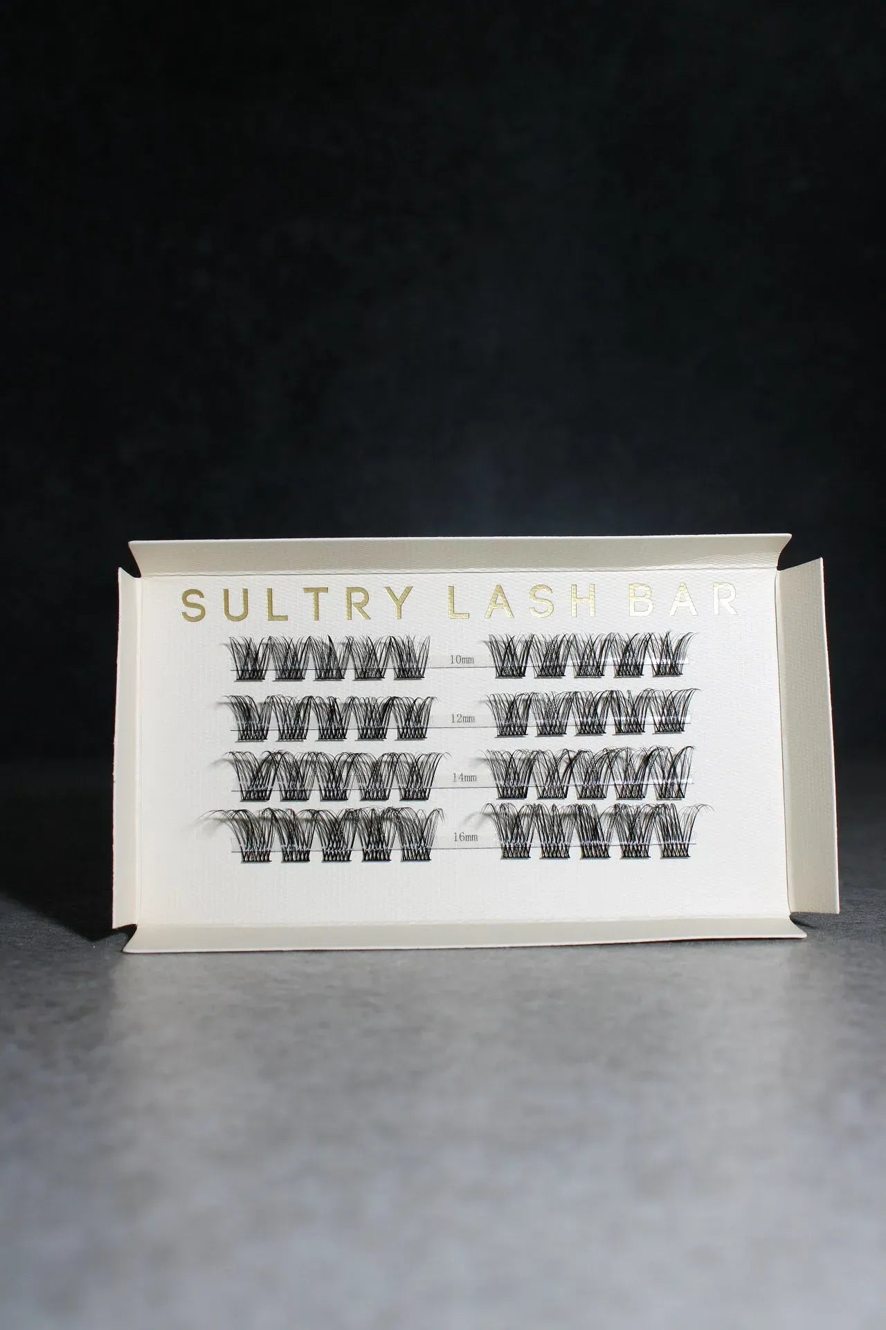 Box of Sultry Lashes on a dark background