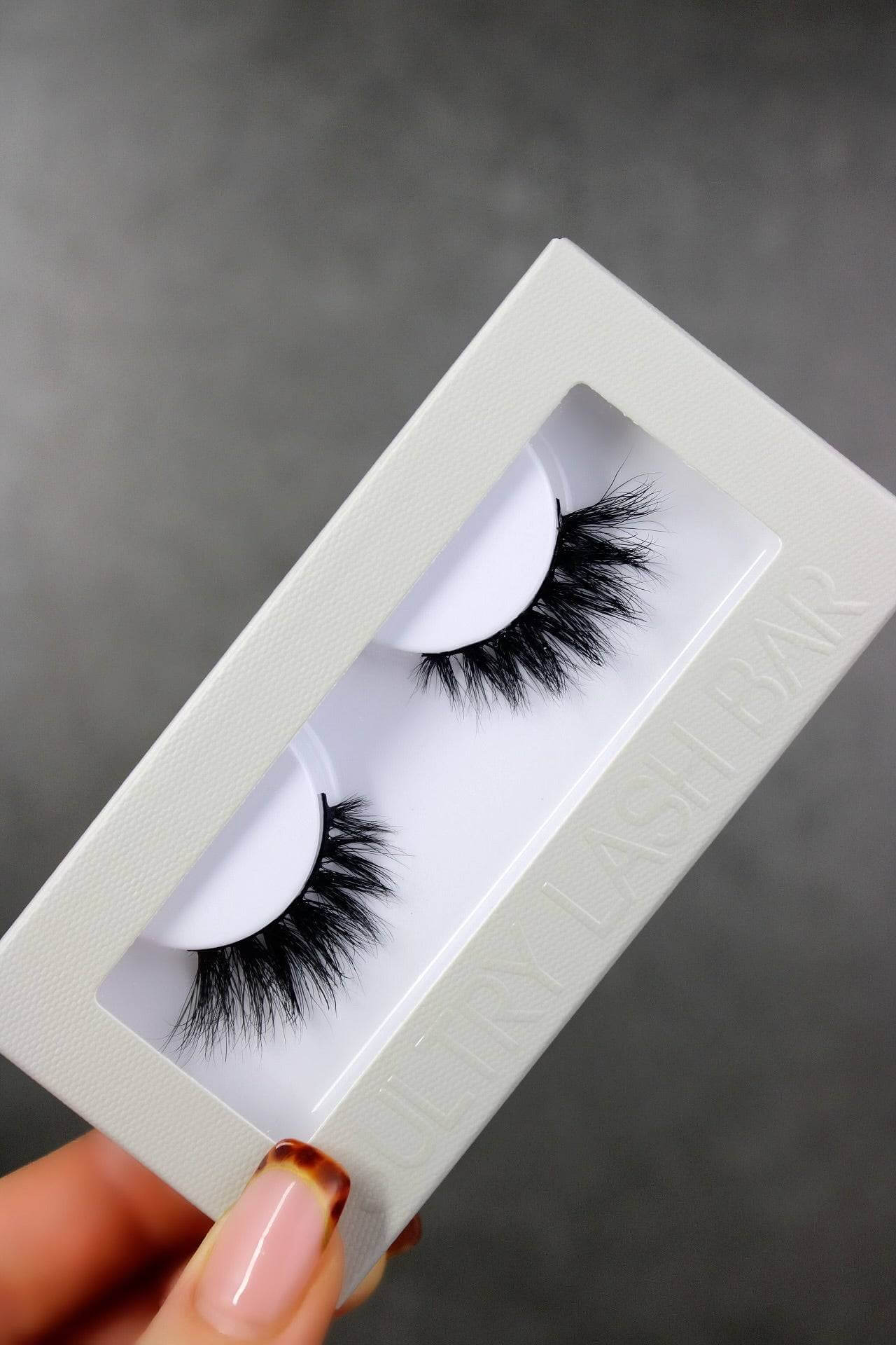 Fox Mega Winged Half Lash in a stylish box, showcasing natural-looking eyelash extensions for a lifted eye effect.