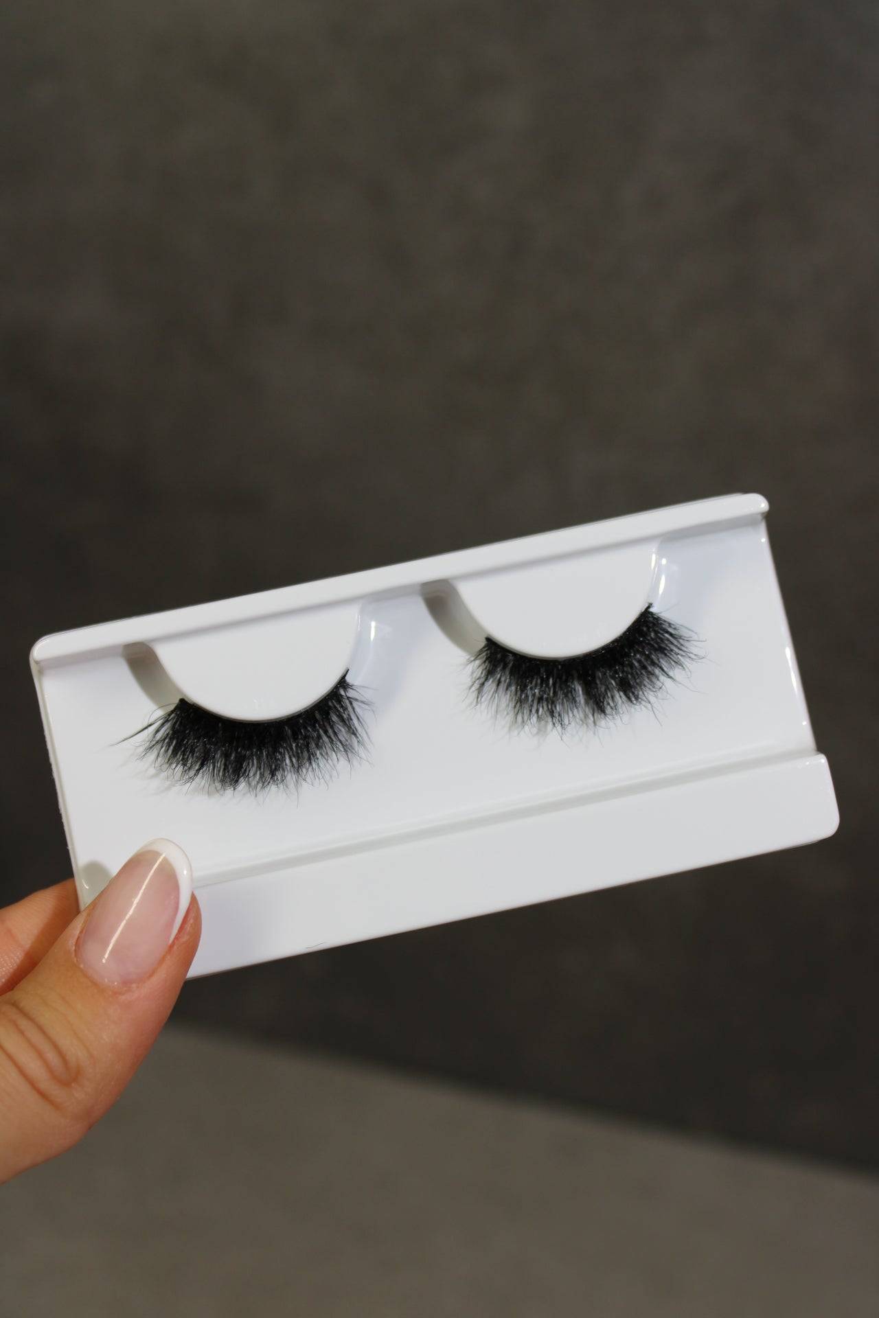 Luna Wispy Fluttery Half lash in packaging, showcasing natural looking eyelash extensions for a captivating cat-eye effect.
