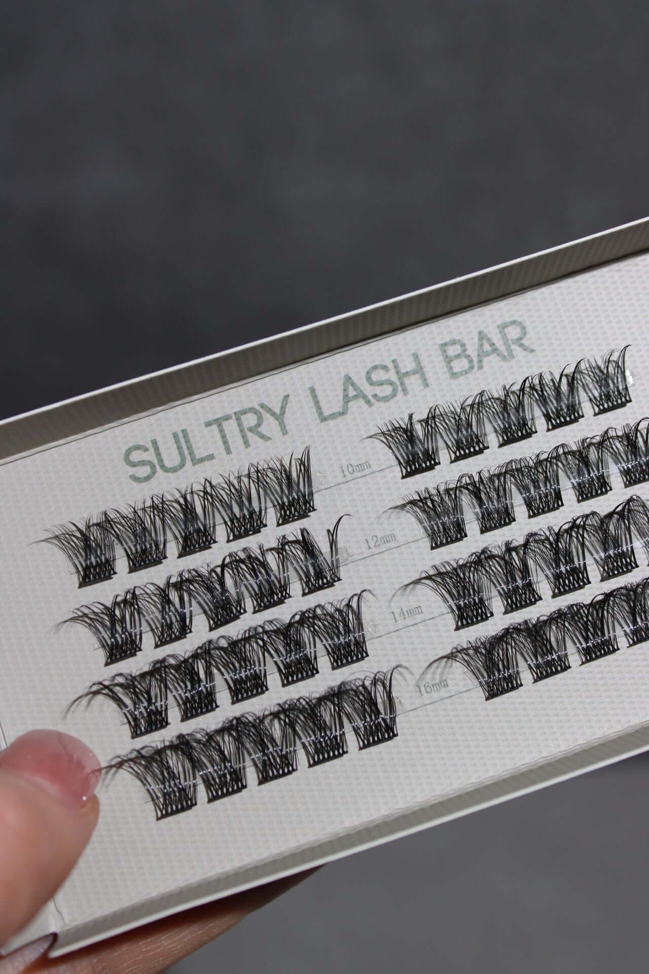 Sultry Lash Bar with a variety of lash extensions for natural looking eyelash enhancements.