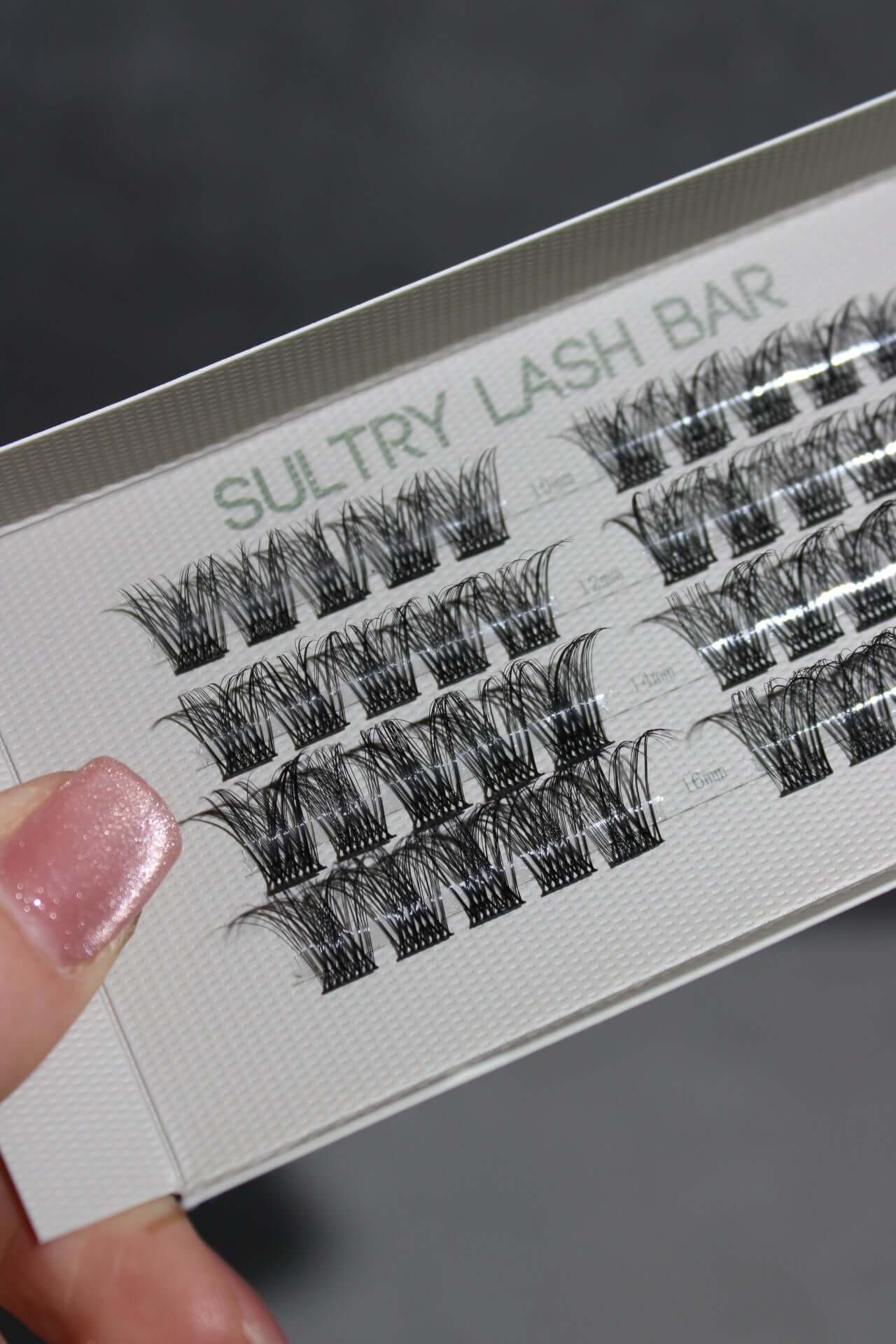 Close-up of Sultry Lash Bar with individual lash clusters ideal for creating natural eyelash extensions.