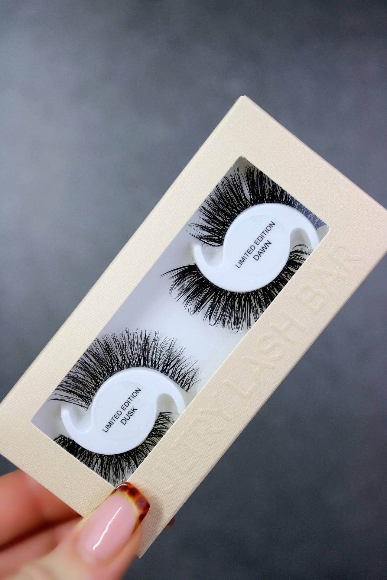 Dusk / Dawn limited edition winged lash extension strips in a luxurious box, featuring hybrid natural lashes.