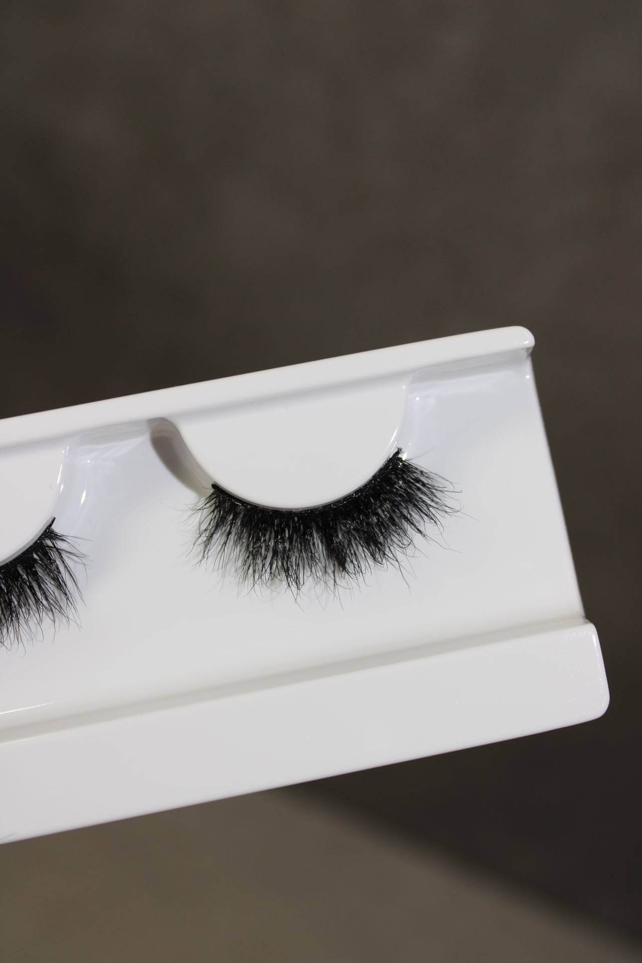 Luna Wispy Fluttery Half lash on display, showcasing natural look eyelash extensions for a captivating cat-eye effect.