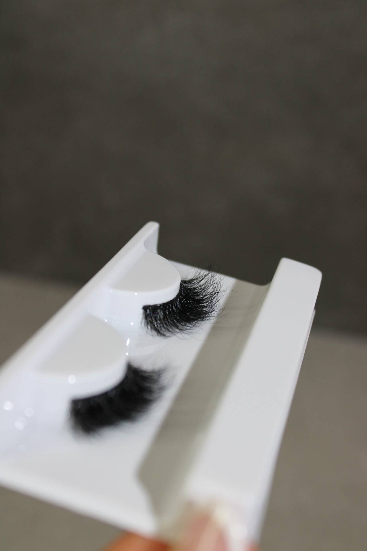 Luna Wispy Fluttery Half lash in packaging, showcasing natural looking eyelash extensions for a captivating cat-eye effect.