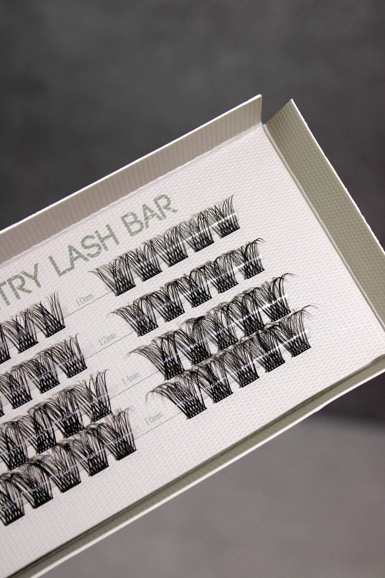 Close-up of SL03 long lasting DIY individual eyelash extensions in various lengths on a display card, showcasing natural look lashes.